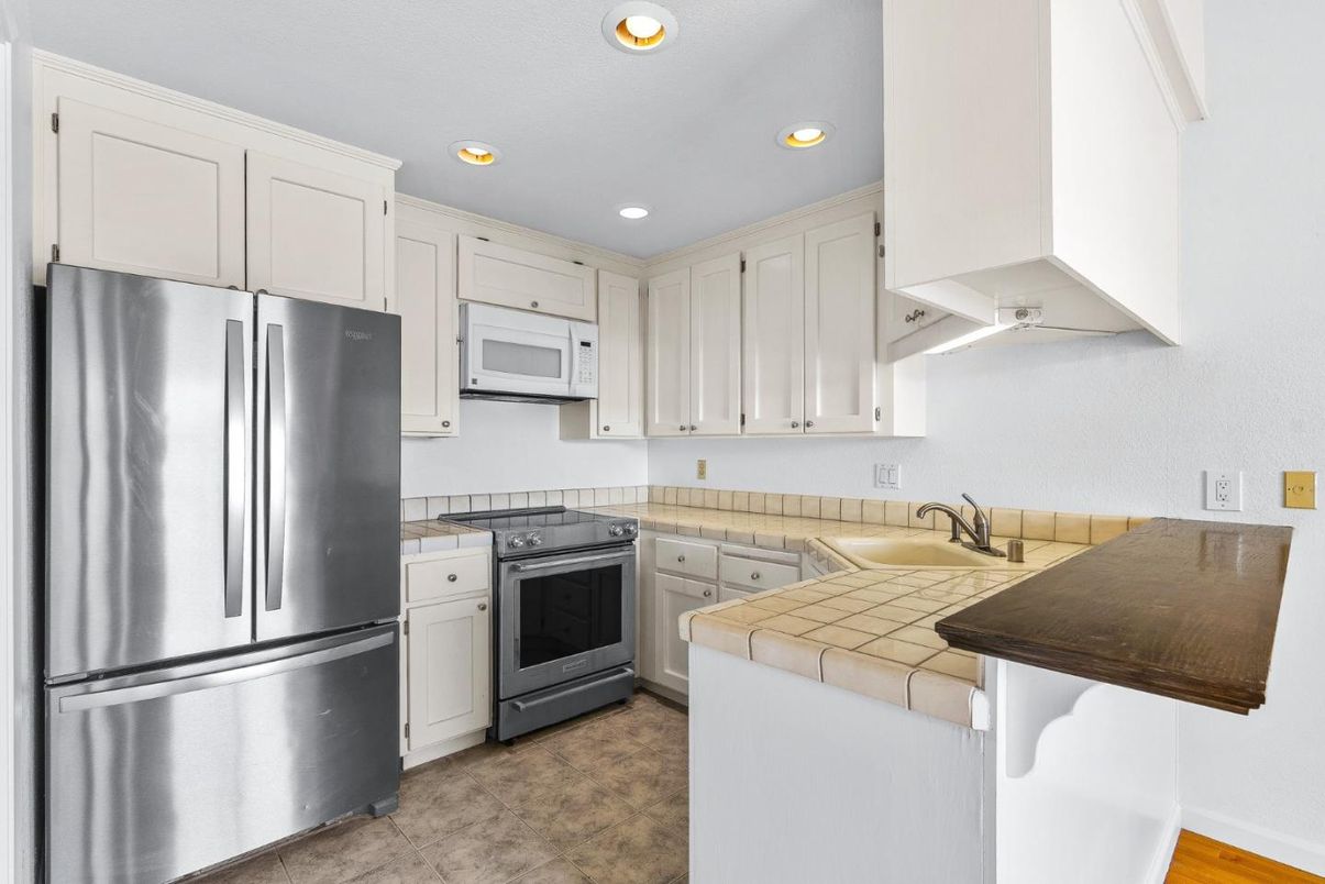 Interior, Kitchen, Recessed Lighting, Tile Countertops