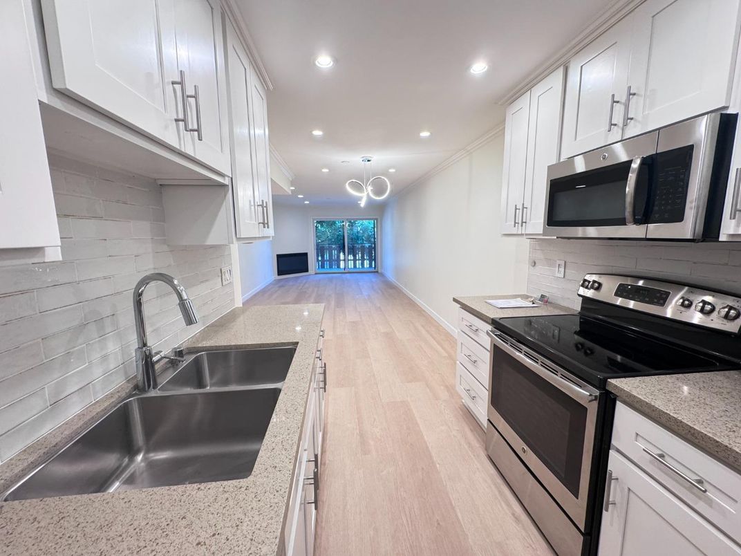 Interior, Kitchen, Pendant Lights, Recessed Lighting, Stainless Steel Appliances, Wood Texture Flooring