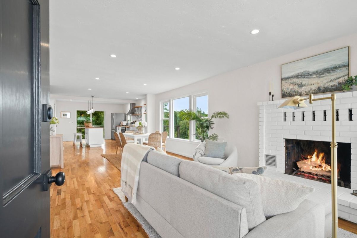 Dining room, Fireplace, Interior, Living room, Pendant Lights, Recessed Lighting, Wood Texture Flooring