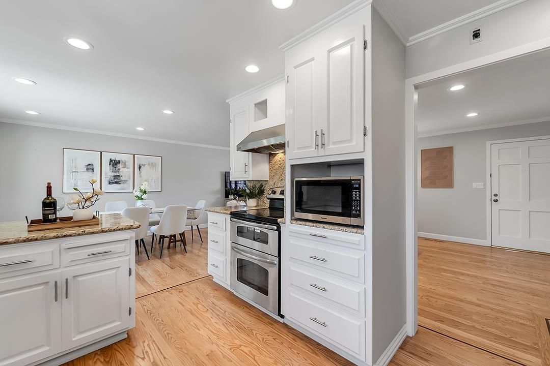 Dining room, Interior, Kitchen, Recessed Lighting, Stainless Steel Appliances, Wood Texture Flooring