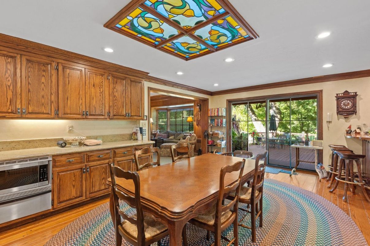 Dining room, Interior, Kitchen, Living room, Recessed Lighting, Stainless Steel Appliances, Wood Texture Flooring