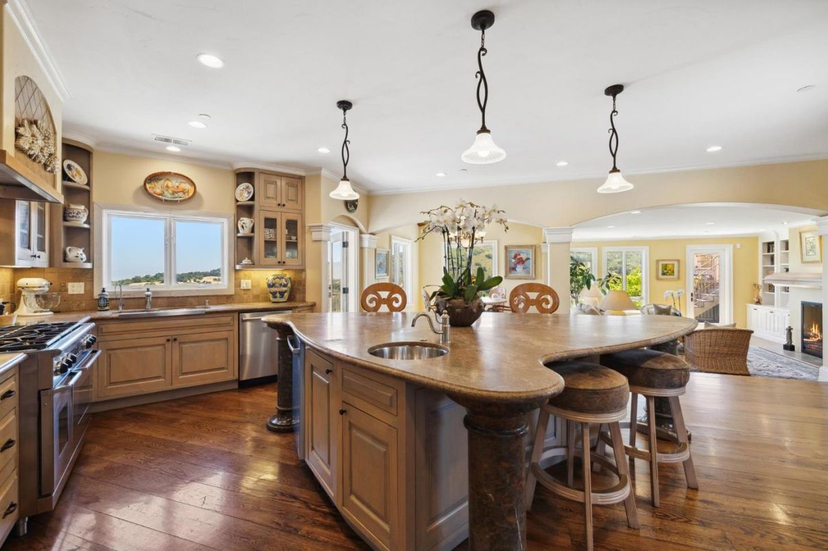 Dining room, Fireplace, Interior, Kitchen, Pendant Lights, Recessed Lighting, Stainless Steel Appliances, Wood Texture Flooring