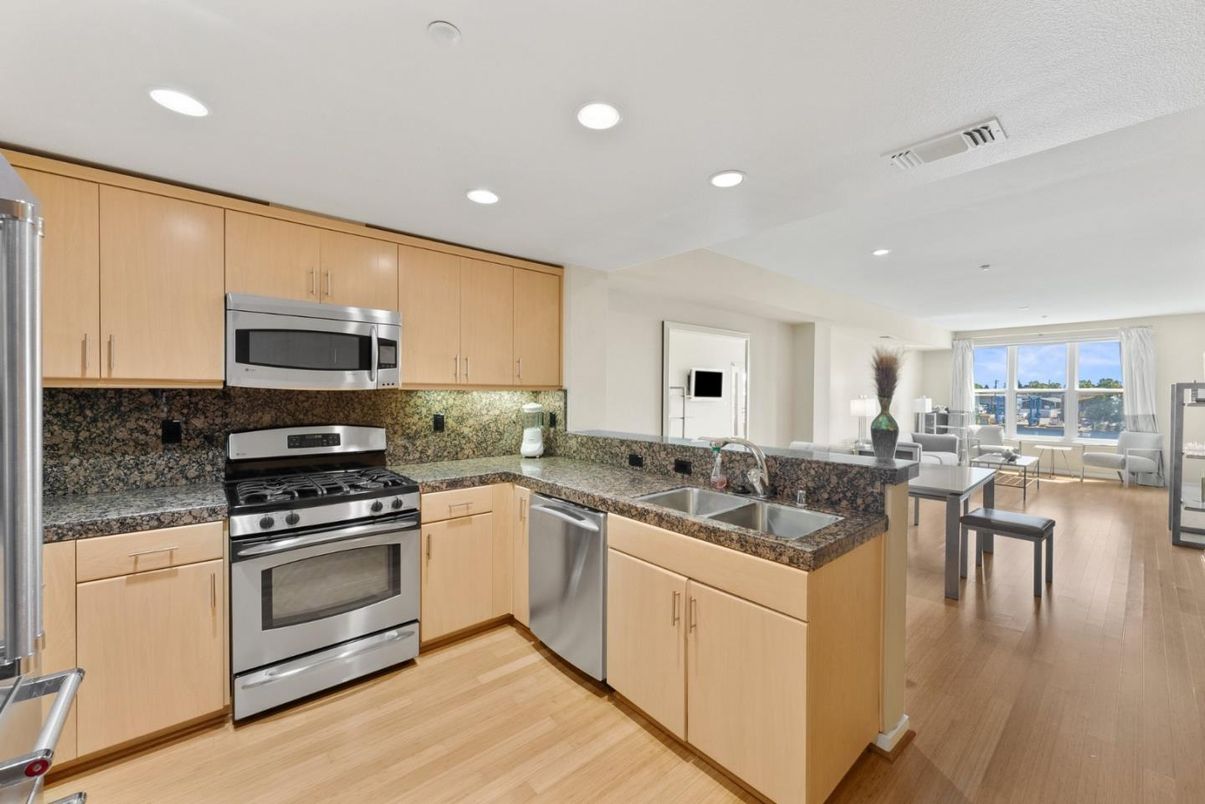 Dining room, Interior, Kitchen, Recessed Lighting, Stainless Steel Appliances, Wood Texture Flooring