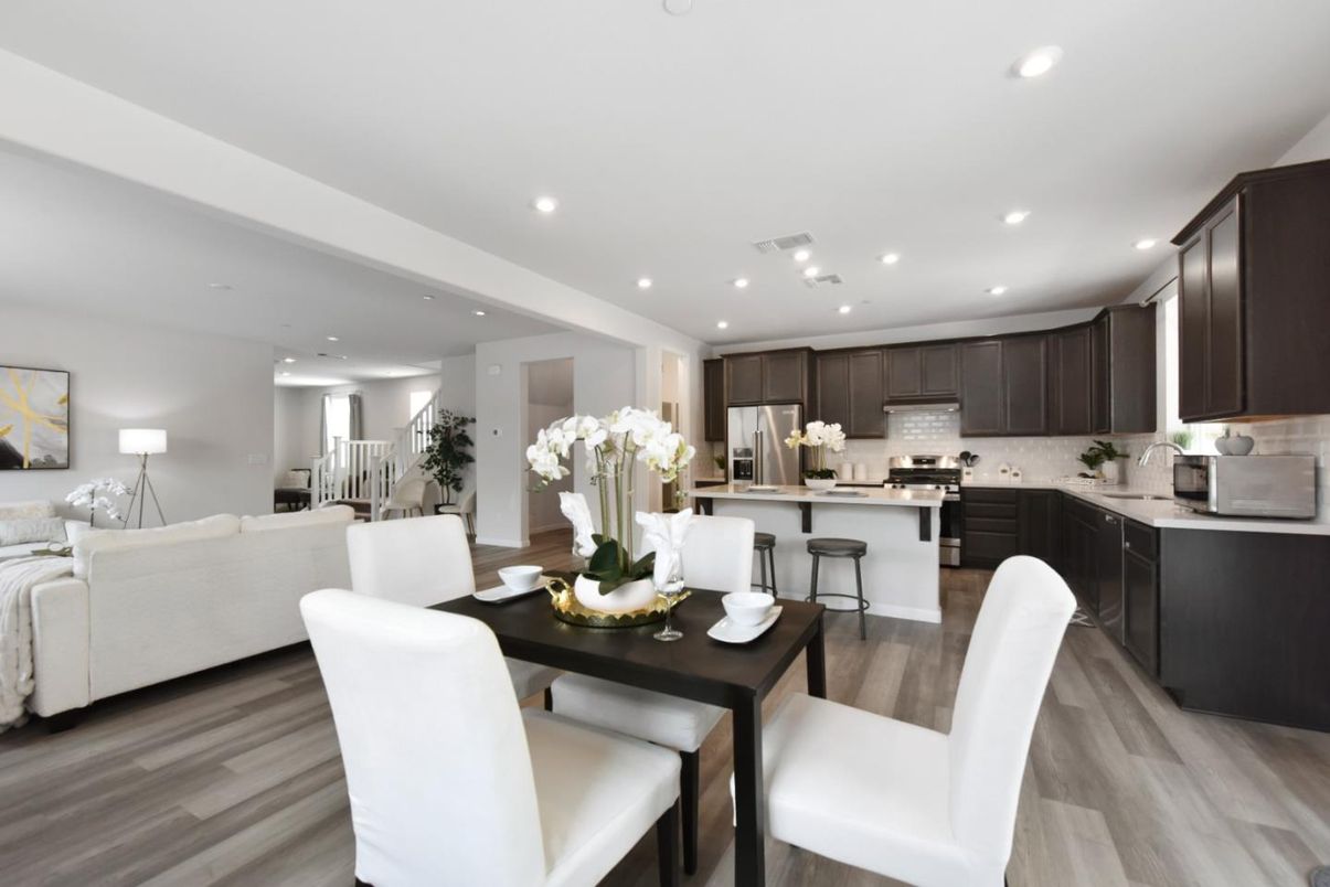Dining room, Interior, Kitchen, Living room, Recessed Lighting, Stainless Steel Appliances, Wood Texture Flooring