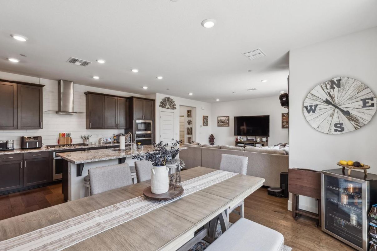 Dining room, Interior, Kitchen, Living room, Recessed Lighting, Stainless Steel Appliances, Wood Texture Flooring