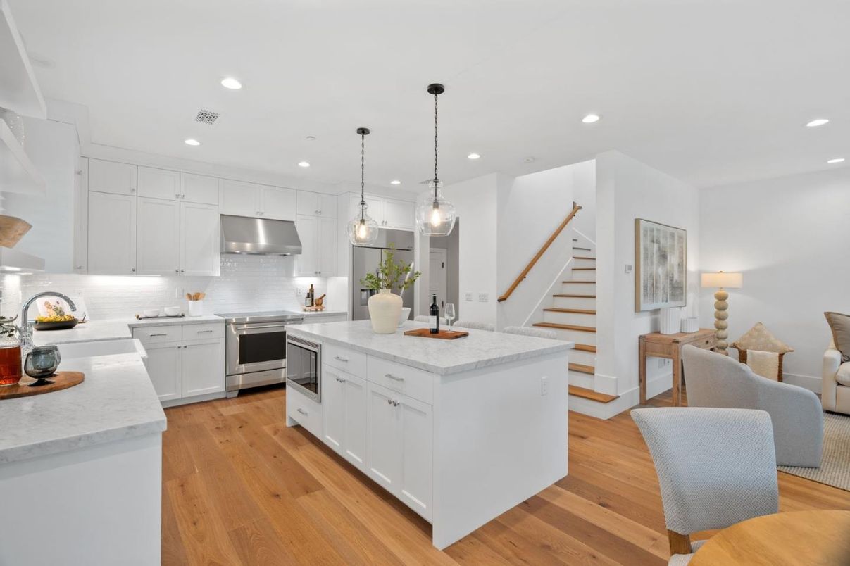 Dining room, Interior, Kitchen, Living room, Pendant Lights, Recessed Lighting, Stainless Steel Appliances, Wood Texture Flooring