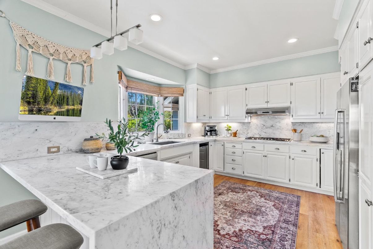 Interior, Kitchen, Marble Walls, Pendant Lights, Recessed Lighting, Stainless Steel Appliances, Wood Texture Flooring