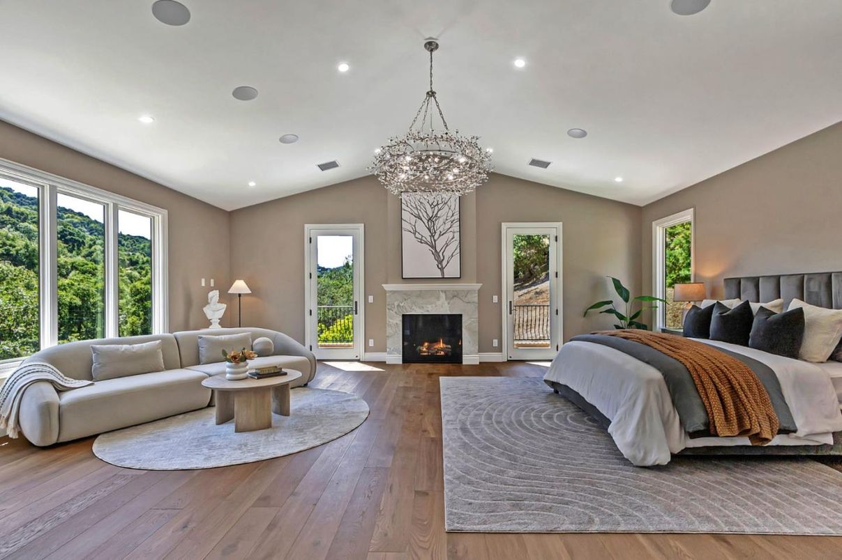 Bedroom, Chandelier, Fireplace, Interior, Recessed Lighting, Wood Texture Flooring