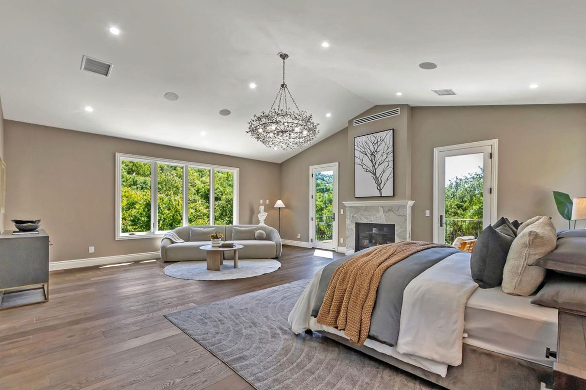 Bedroom, Chandelier, Fireplace, Interior, Recessed Lighting, Wood Texture Flooring