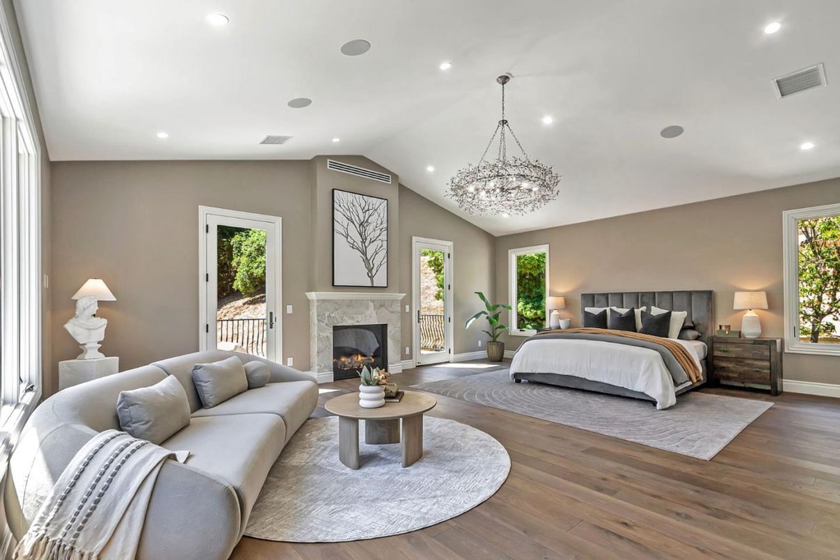 Bedroom, Chandelier, Fireplace, Interior, Recessed Lighting, Wood Texture Flooring