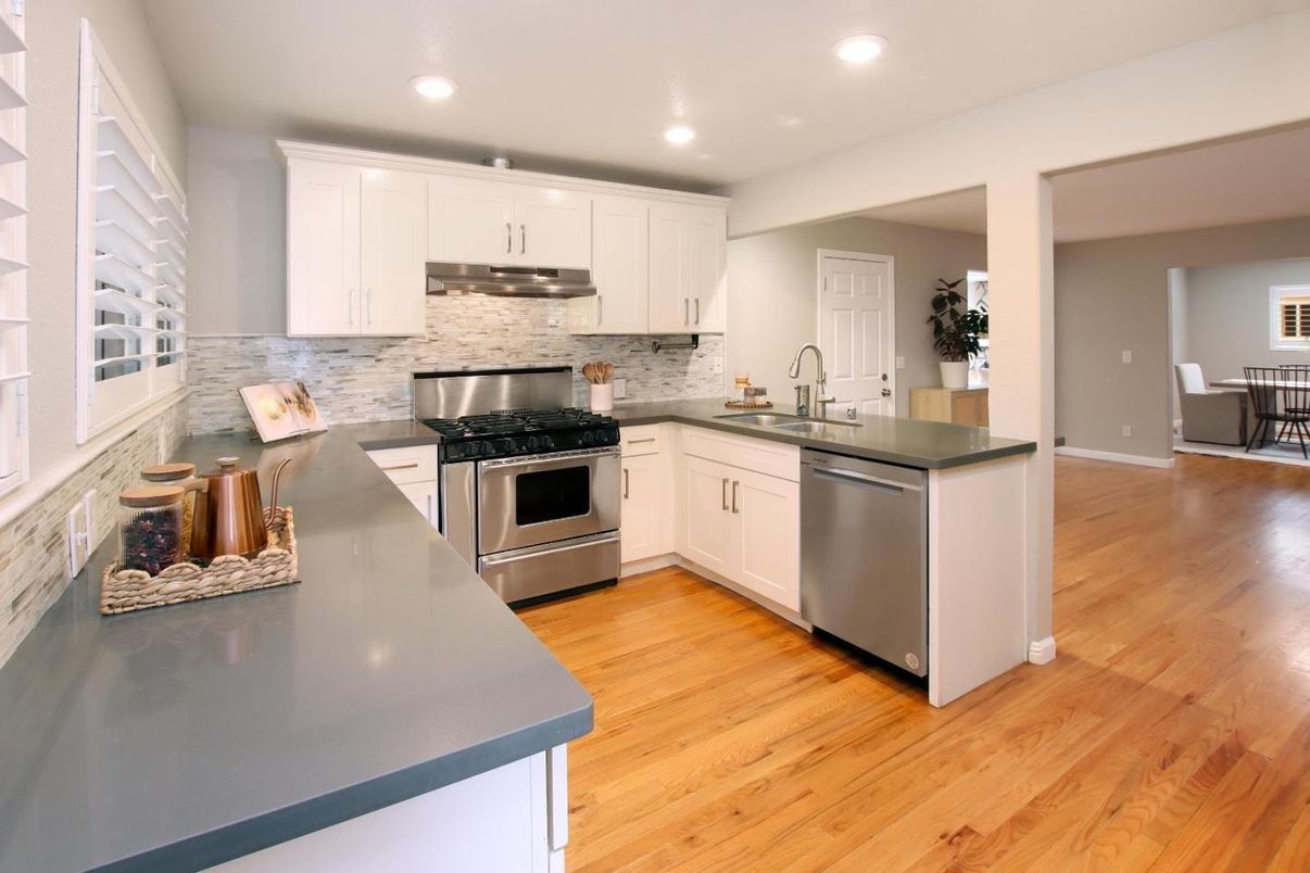 Dining room, Interior, Kitchen, Recessed Lighting, Stainless Steel Appliances, Wood Texture Flooring