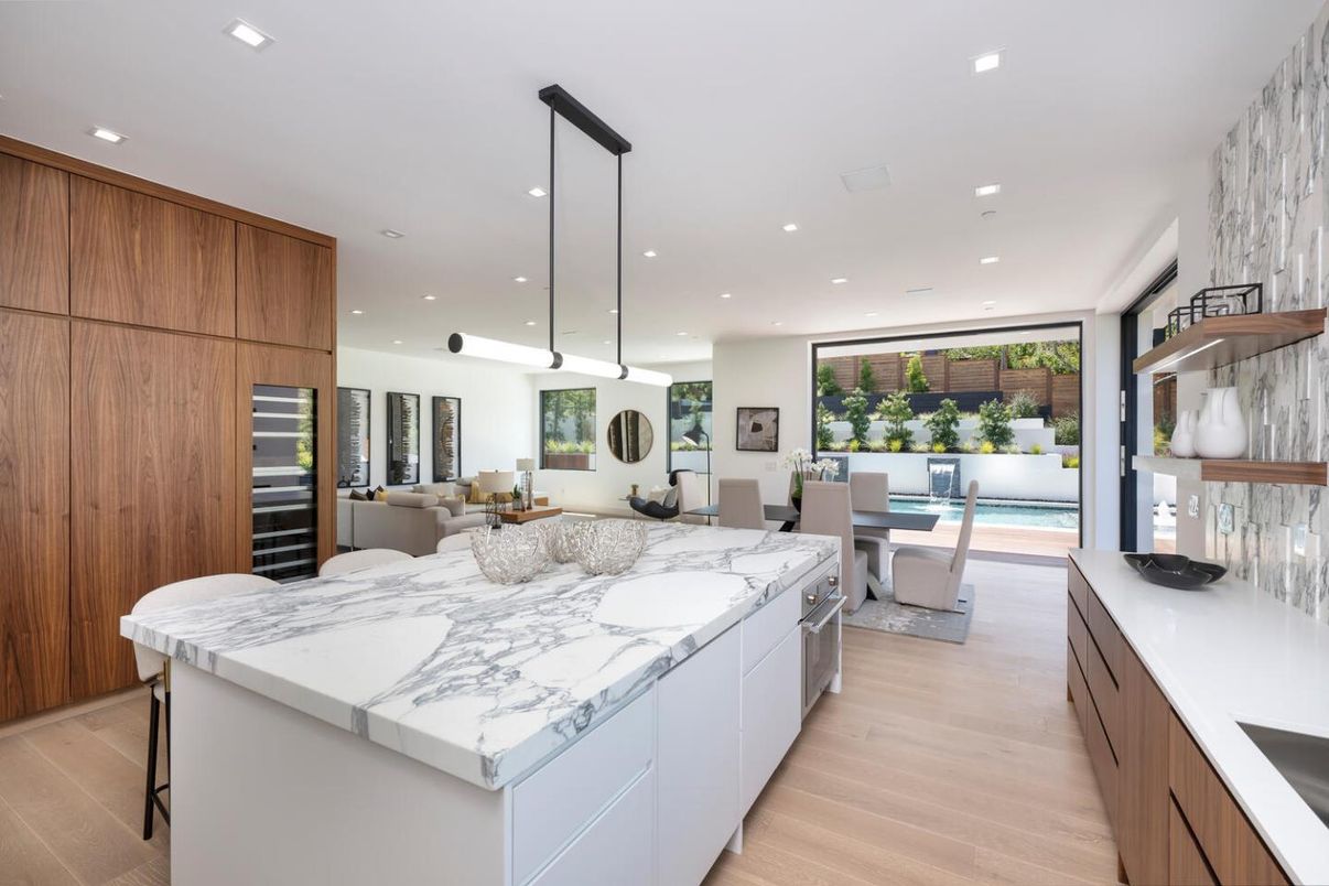 Dining room, Interior, Kitchen, Living room, Pendant Lights, Recessed Lighting, Stainless Steel Appliances, Wood Texture Flooring