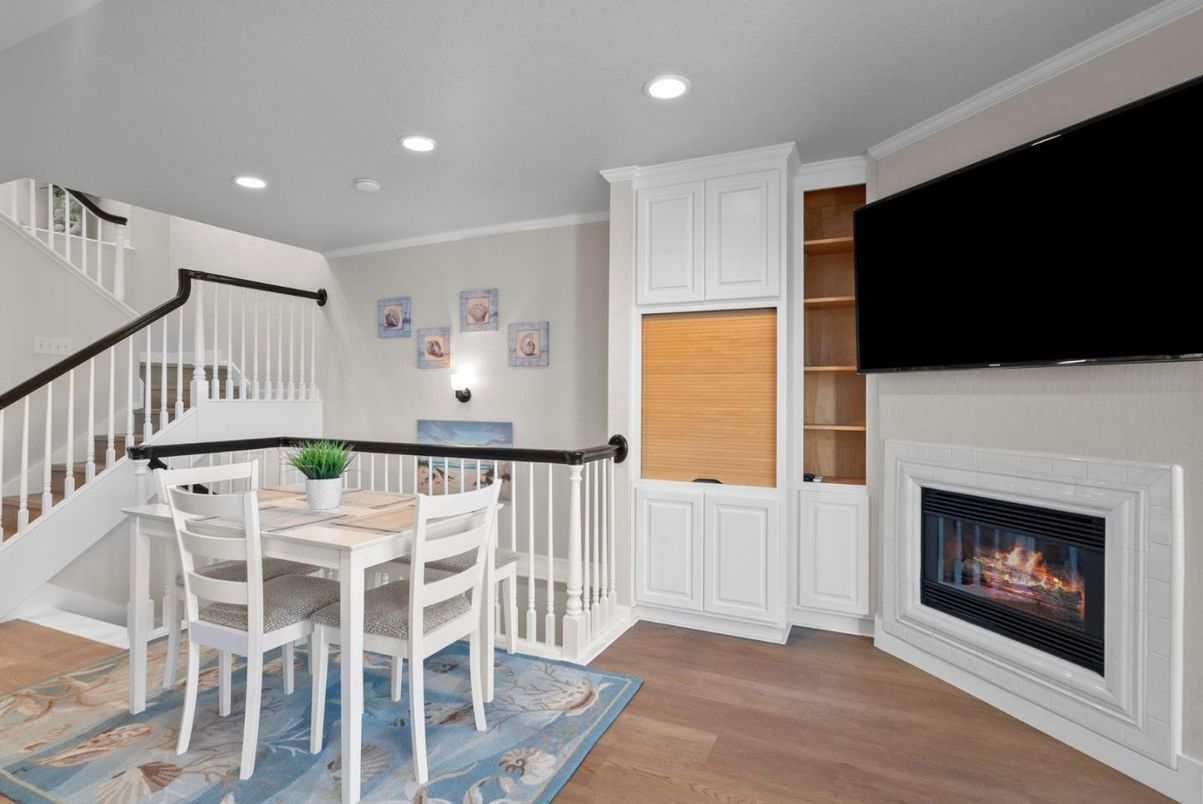 Dining room, Fireplace, Interior, Recessed Lighting, Water, Wood Texture Flooring