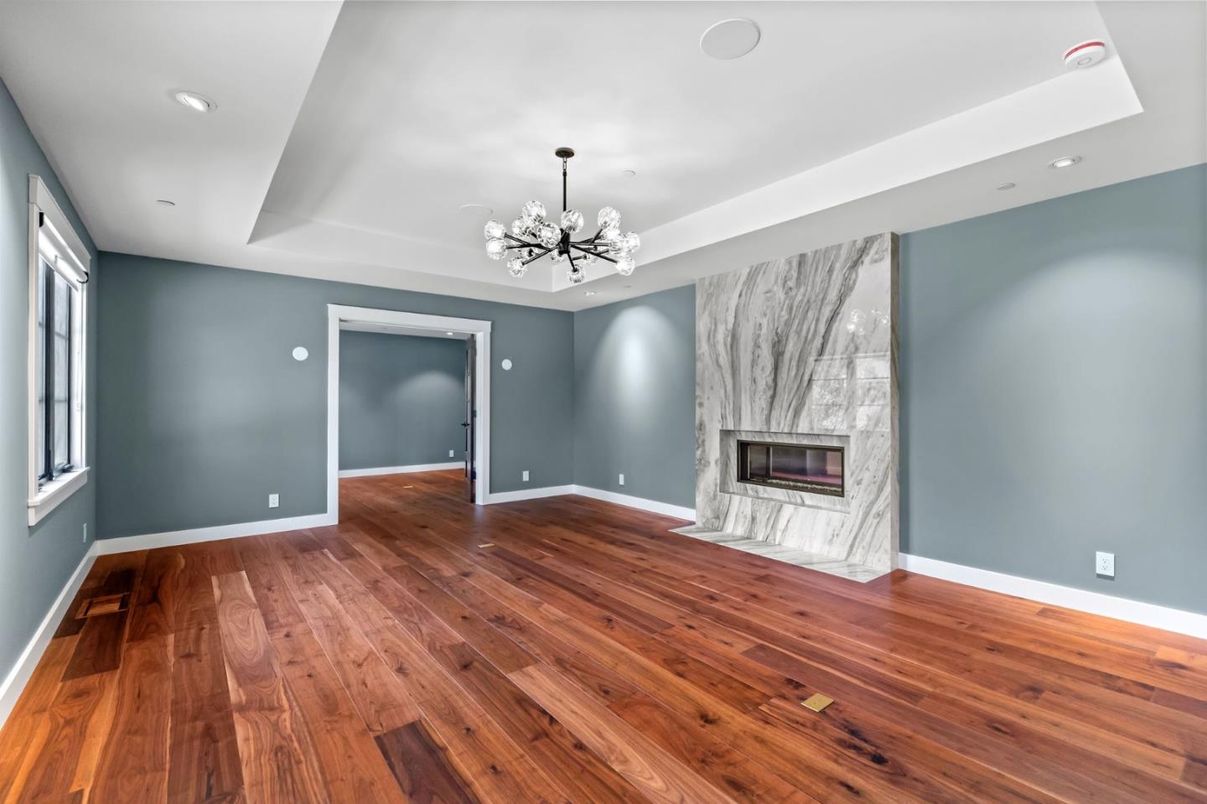 Empty room, Fireplace, Interior, Pendant Lights, Recessed Lighting, Wood Texture Flooring