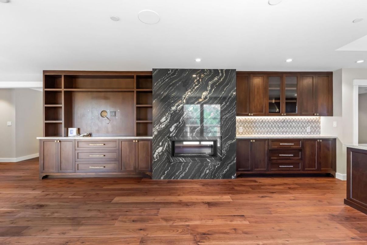 Fireplace, Interior, Marble Walls, Recessed Lighting, Wood Texture Flooring