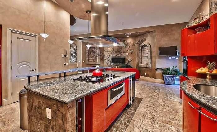 Fireplace, Interior, Kitchen, Pendant Lights, Recessed Lighting, Stainless Steel Appliances, Stone Walls