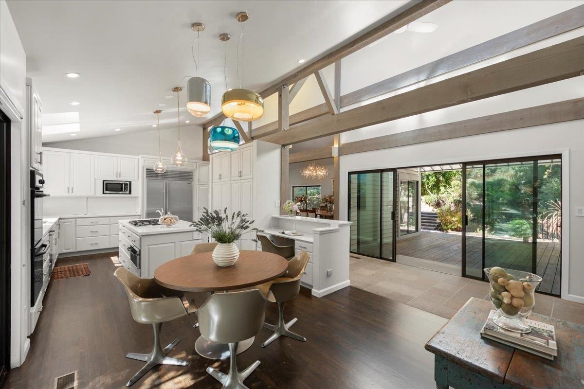 Dining room, Interior, Kitchen, Pendant Lights, Recessed Lighting, Stainless Steel Appliances, Wood Texture Flooring