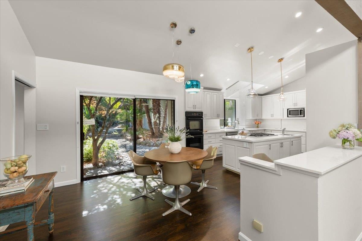 Dining room, Interior, Kitchen, Pendant Lights, Recessed Lighting, Stainless Steel Appliances, Wood Texture Flooring