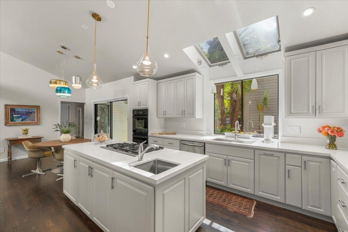 Dining room, Glass Ceilings, Interior, Kitchen, Pendant Lights, Recessed Lighting, Stainless Steel Appliances, Wood Texture Flooring