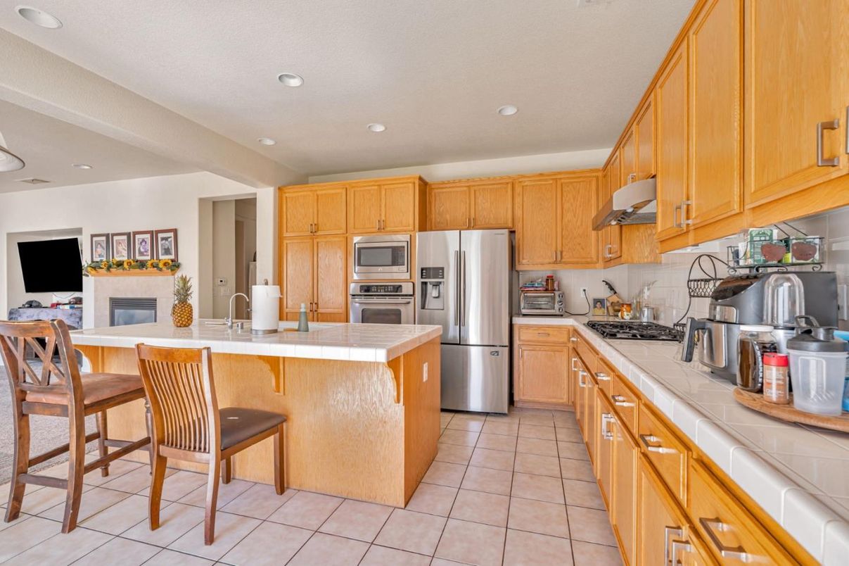 Interior, Kitchen, Recessed Lighting, Stainless Steel Appliances, Tile Countertops