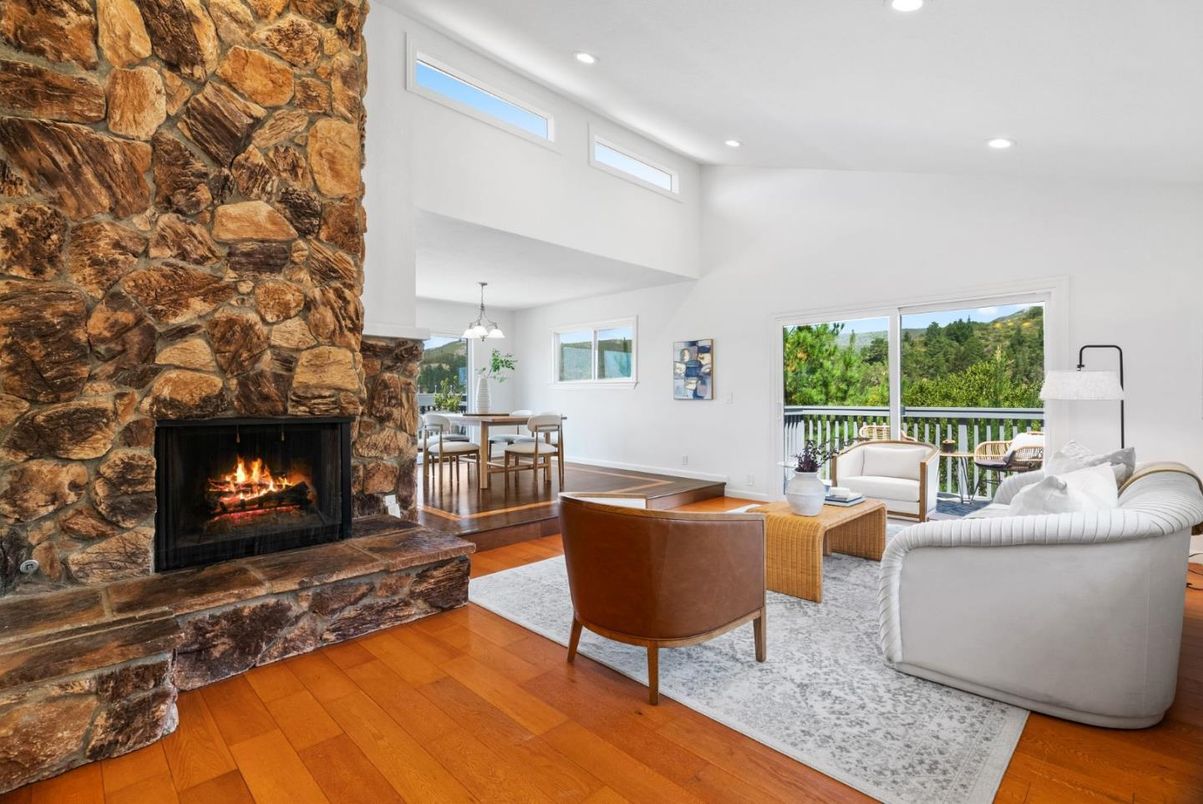 Dining room, Fireplace, Interior, Living room, Pendant Lights, Recessed Lighting, Stone Walls, Wood Texture Flooring