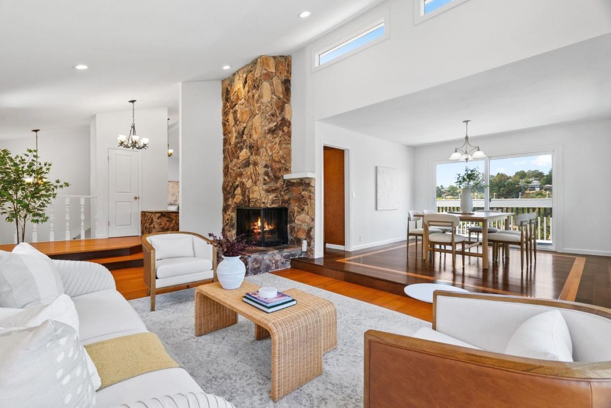 Chandelier, Dining room, Fireplace, Interior, Living room, Pendant Lights, Recessed Lighting, Wood Texture Flooring