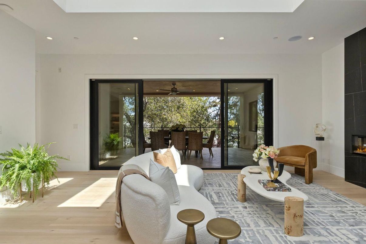 Dining room, Fireplace, Interior, Living room, Recessed Lighting, Wood Texture Flooring