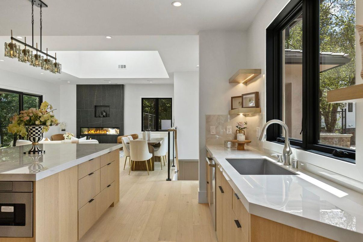 Dining room, Fireplace, Interior, Kitchen, Pendant Lights, Recessed Lighting, Wood Texture Flooring