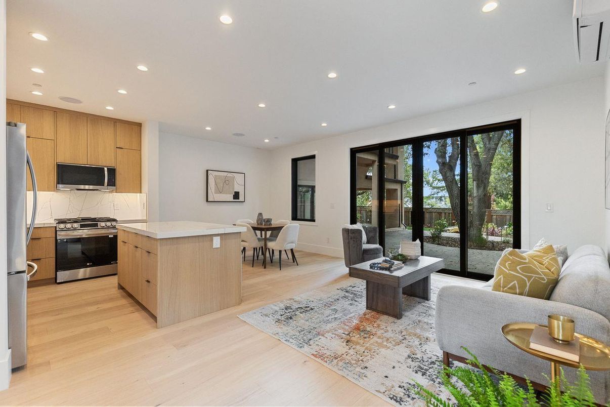 Dining room, Interior, Kitchen, Living room, Recessed Lighting, Stainless Steel Appliances, Wood Texture Flooring