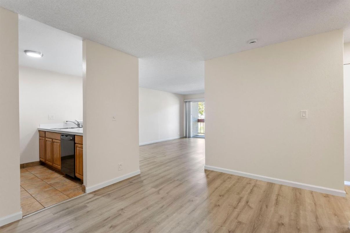 Empty room, Interior, Kitchen, Stainless Steel Appliances, Wood Texture Flooring