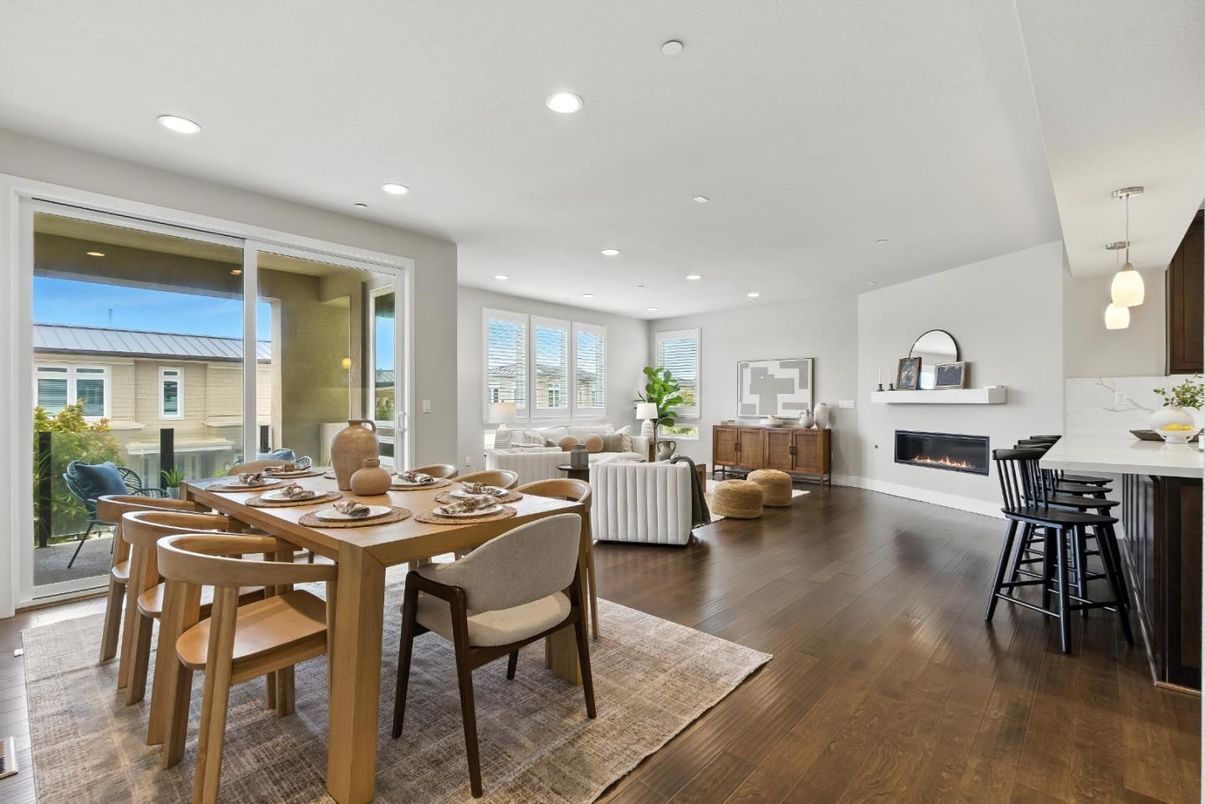 Dining room, Fireplace, Interior, Living room, Pendant Lights, Recessed Lighting, Wood Texture Flooring
