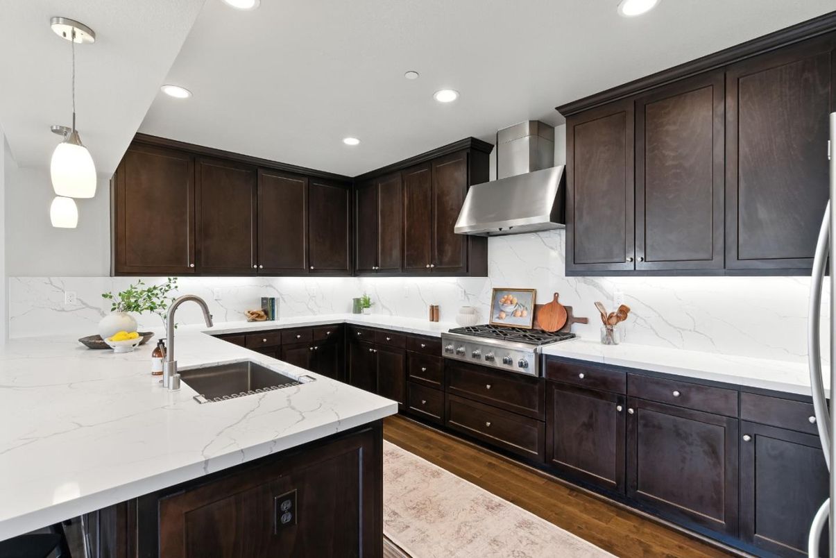 Interior, Kitchen, Marble Walls, Pendant Lights, Recessed Lighting, Stainless Steel Appliances, Wood Texture Flooring