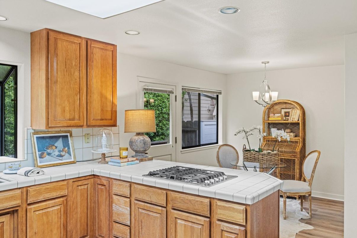 Dining room, Interior, Kitchen, Pendant Lights, Recessed Lighting, Tile Countertops, Wood Texture Flooring