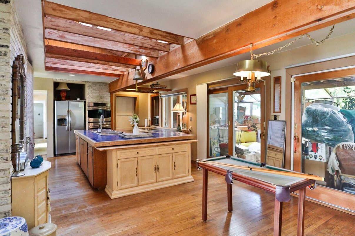 Billiard Table, Game Room, Interior, Kitchen, Recessed Lighting, Stainless Steel Appliances, Stone Walls, Wooden Beams, Wood Texture Flooring