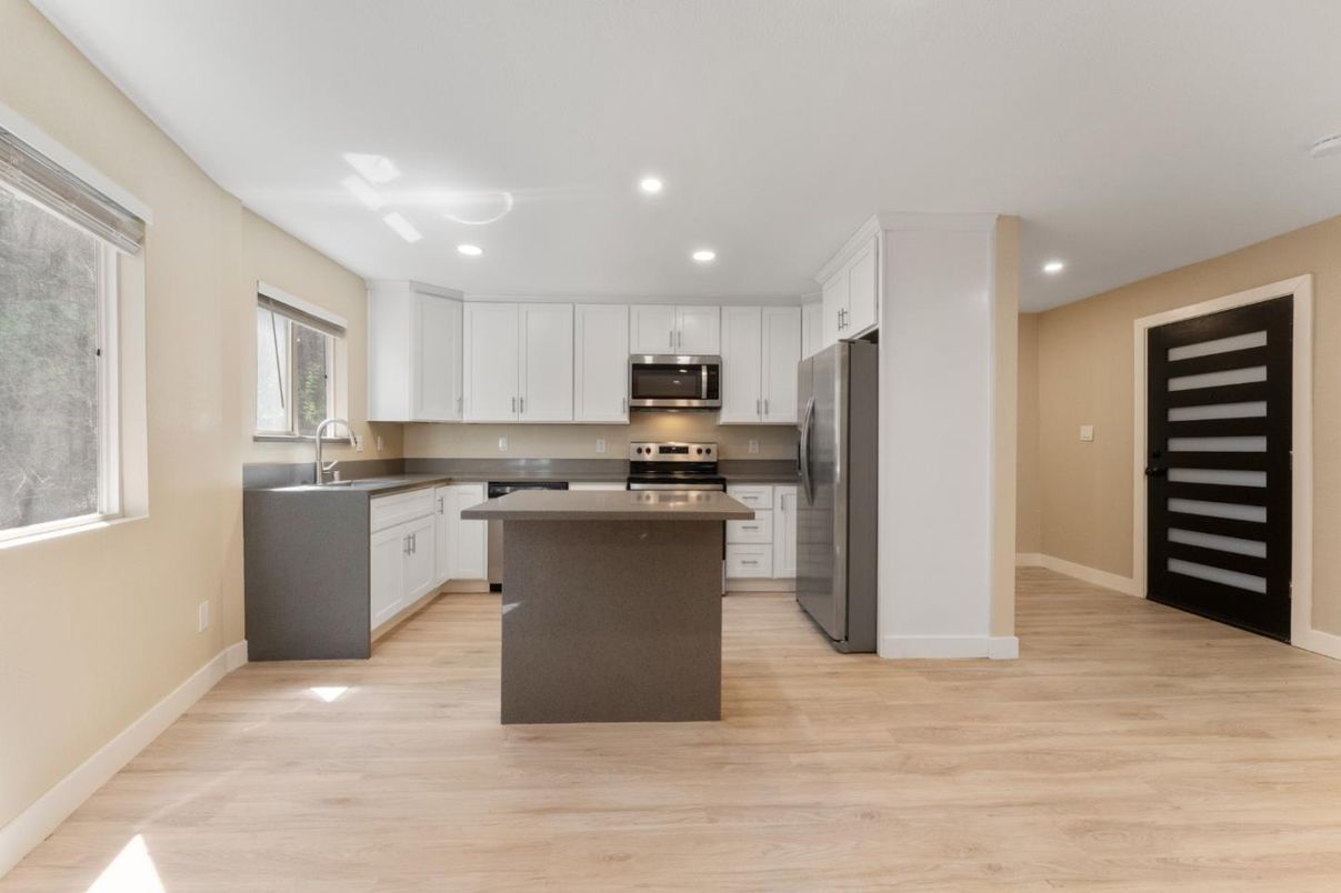 Interior, Kitchen, Recessed Lighting, Stainless Steel Appliances, Wood Texture Flooring
