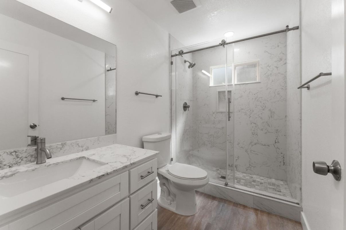 Bathroom, Glass Shower, Interior, Marble Walls, Wood Texture Flooring