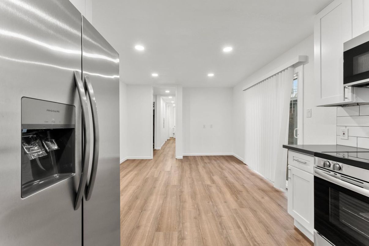 Interior, Kitchen, Recessed Lighting, Stainless Steel Appliances, Wood Texture Flooring