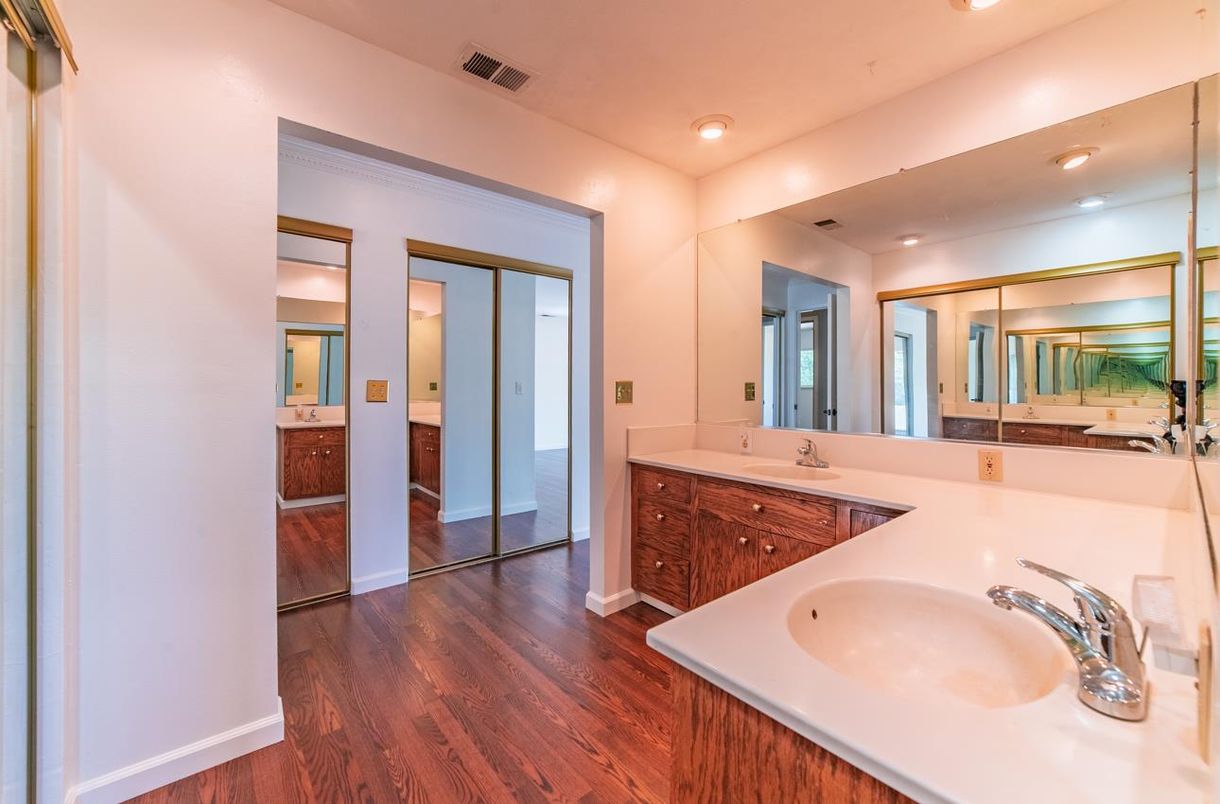 Bathroom, Dual Sink Vanities, Interior, Recessed Lighting, Wood Texture Flooring