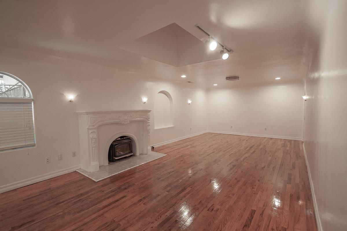 Empty room, Fireplace, Interior, Recessed Lighting, Wood Texture Flooring