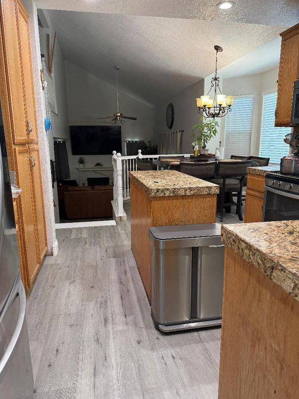 Chandelier, Dining room, Interior, Kitchen, Living room, Pendant Lights, Recessed Lighting, Wood Texture Flooring