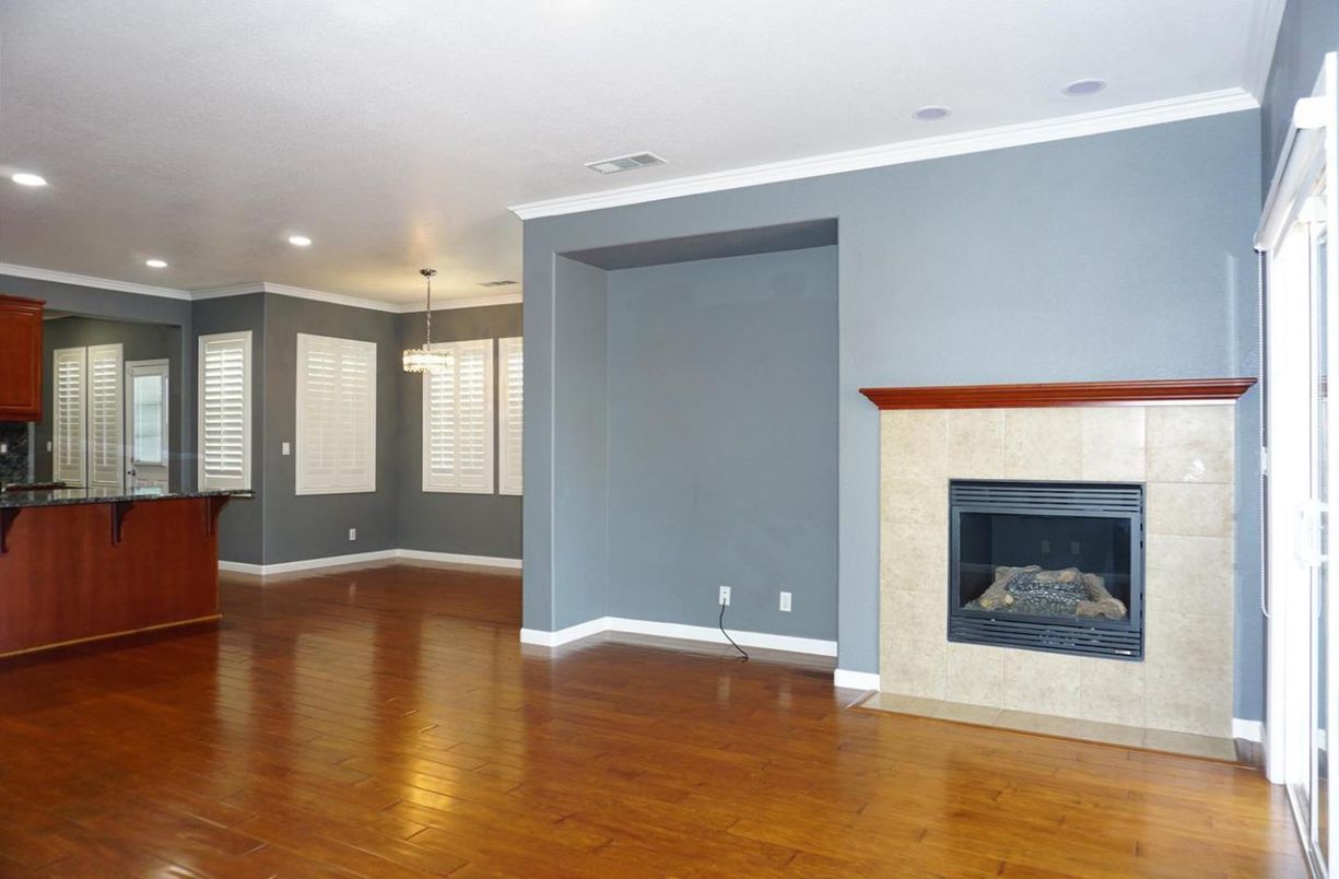Chandelier, Empty room, Fireplace, Interior, Pendant Lights, Recessed Lighting, Wood Texture Flooring