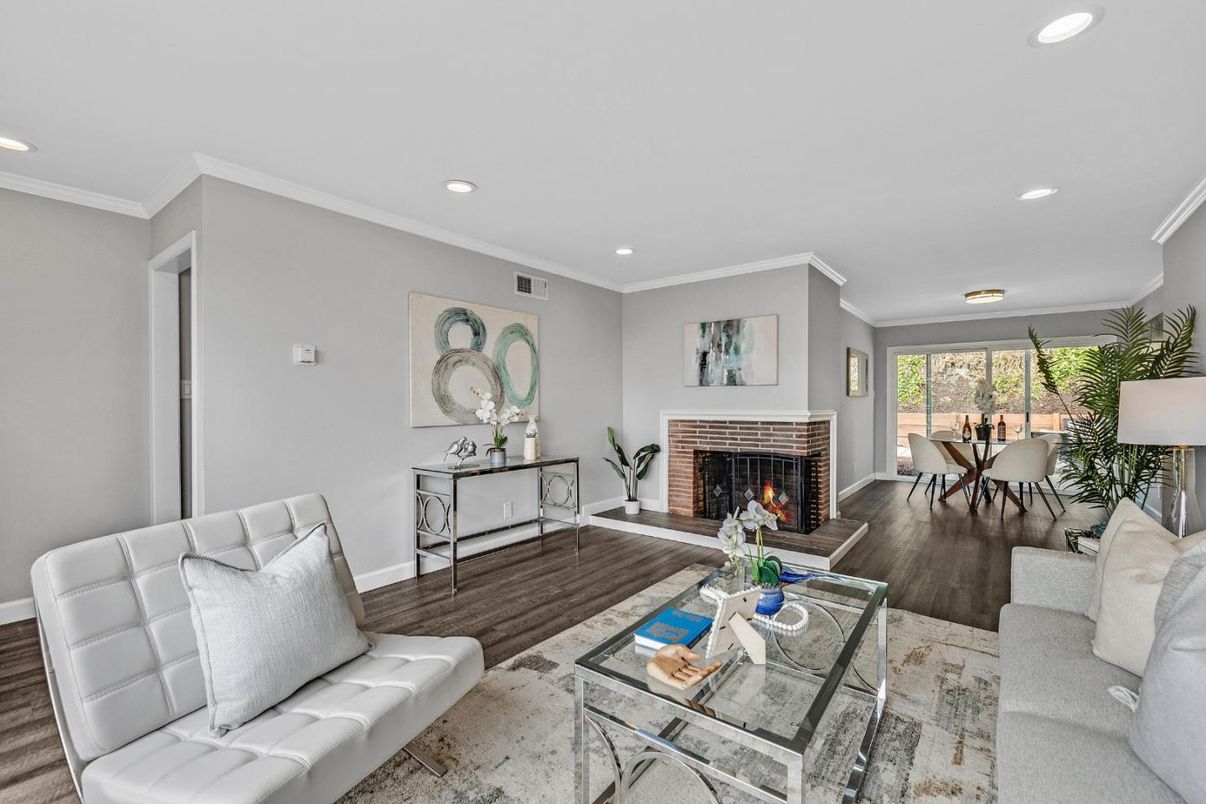 Dining room, Fireplace, Interior, Living room, Recessed Lighting, Wood Texture Flooring