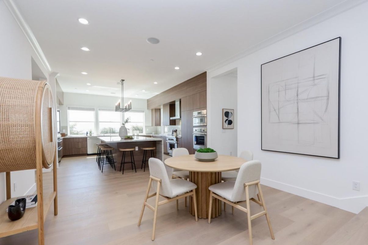 Chandelier, Dining room, Interior, Kitchen, Pendant Lights, Recessed Lighting, Stainless Steel Appliances, Wood Texture Flooring