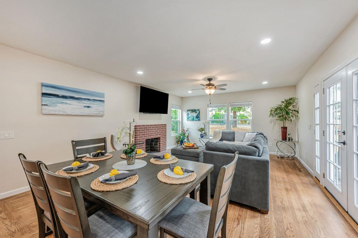 Dining room, Fireplace, Interior, Living room, Recessed Lighting, Wood Texture Flooring