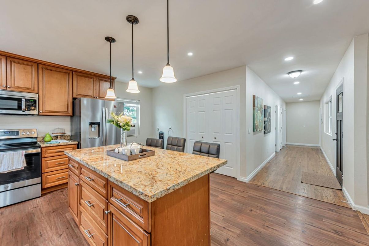 Interior, Kitchen, Pendant Lights, Recessed Lighting, Stainless Steel Appliances, Wood Texture Flooring