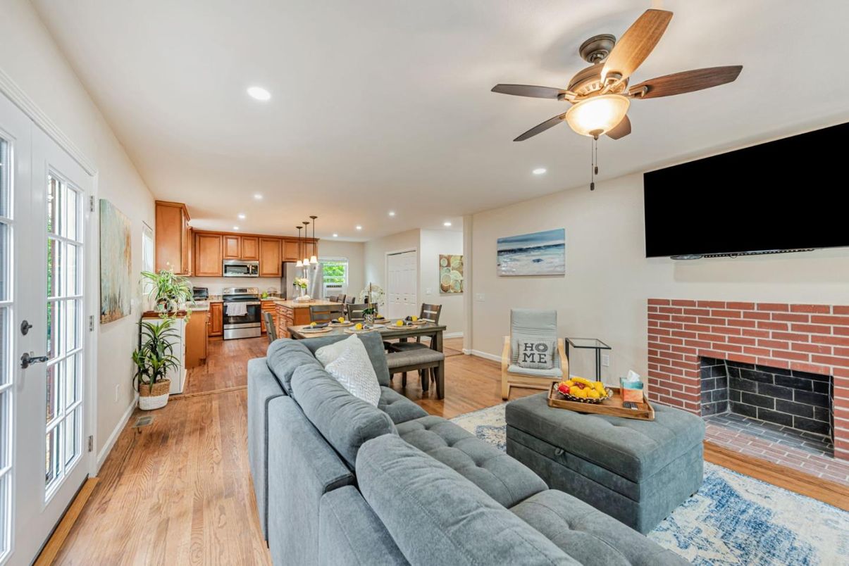 Dining room, Fireplace, Interior, Kitchen, Living room, Pendant Lights, Recessed Lighting, Stainless Steel Appliances, Stone Walls, Wood Texture Flooring