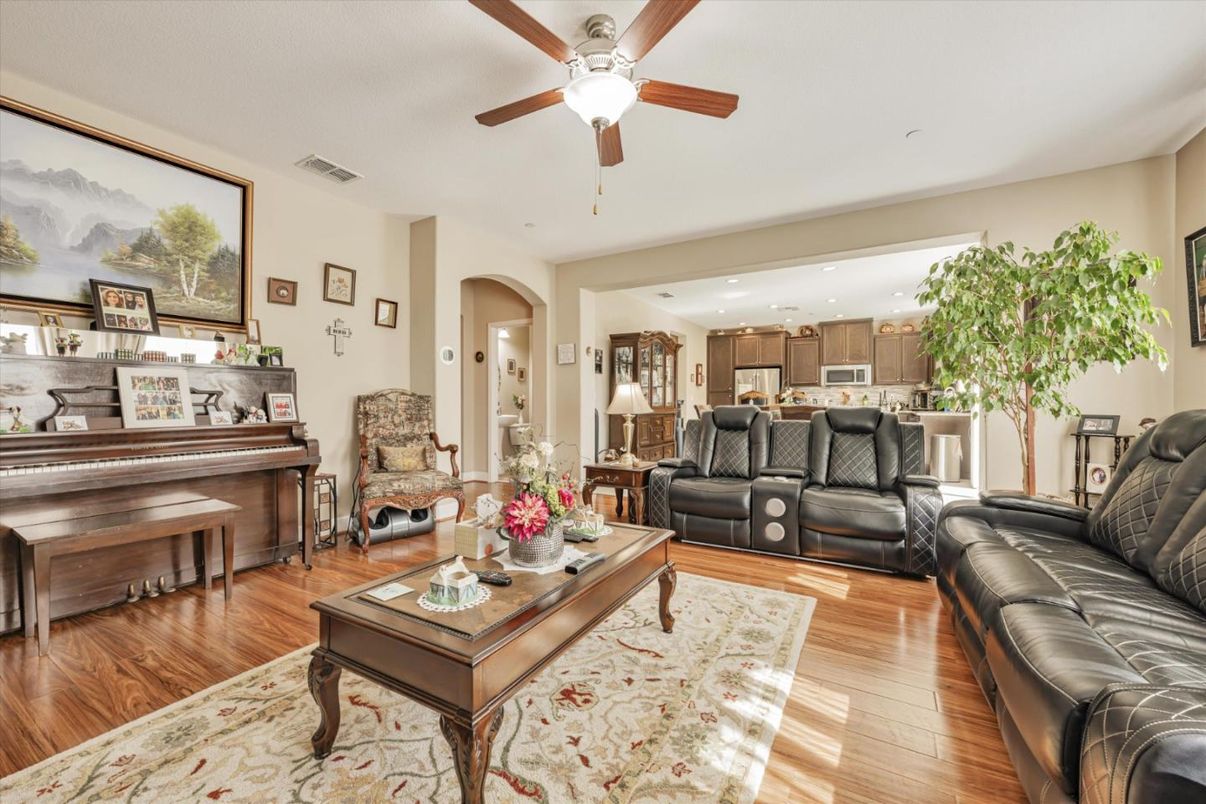Interior, Kitchen, Living room, Piano, Recessed Lighting, Stainless Steel Appliances, Wood Texture Flooring