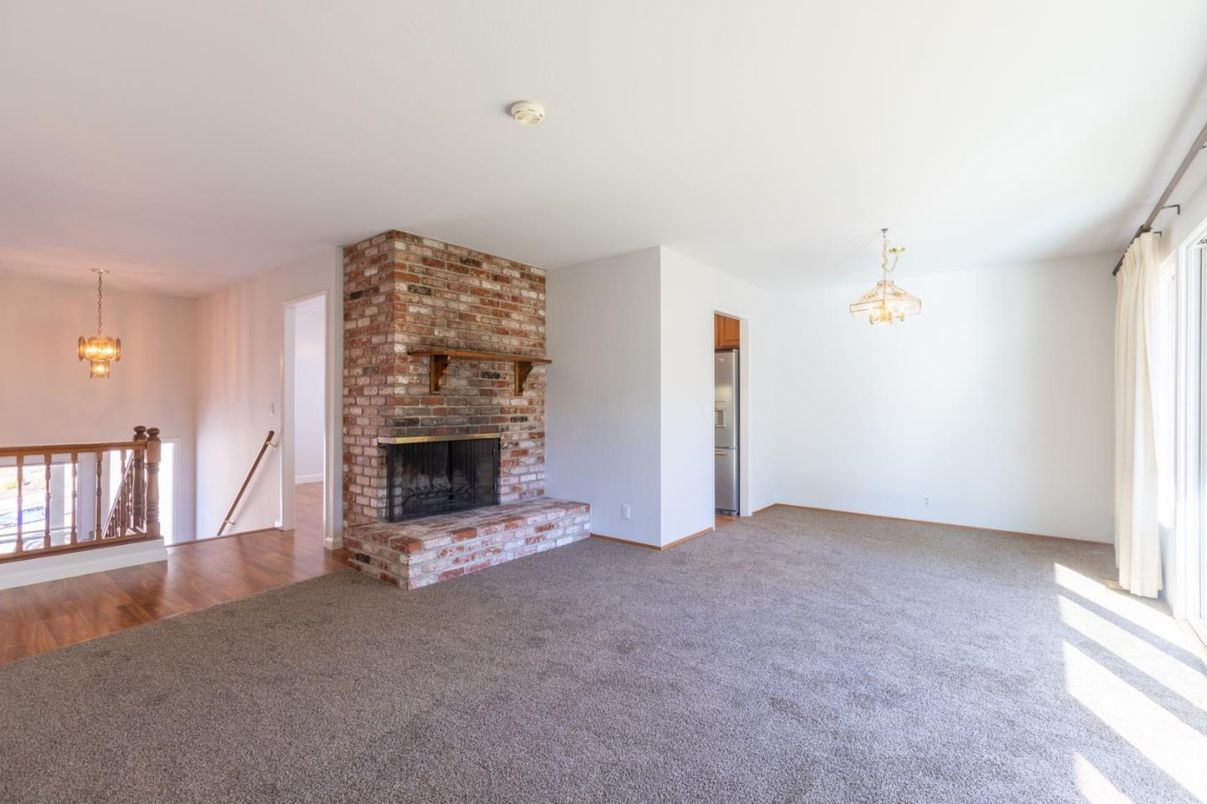 Empty room, Fireplace, Interior, Pendant Lights, Stone Walls, Wood Texture Flooring