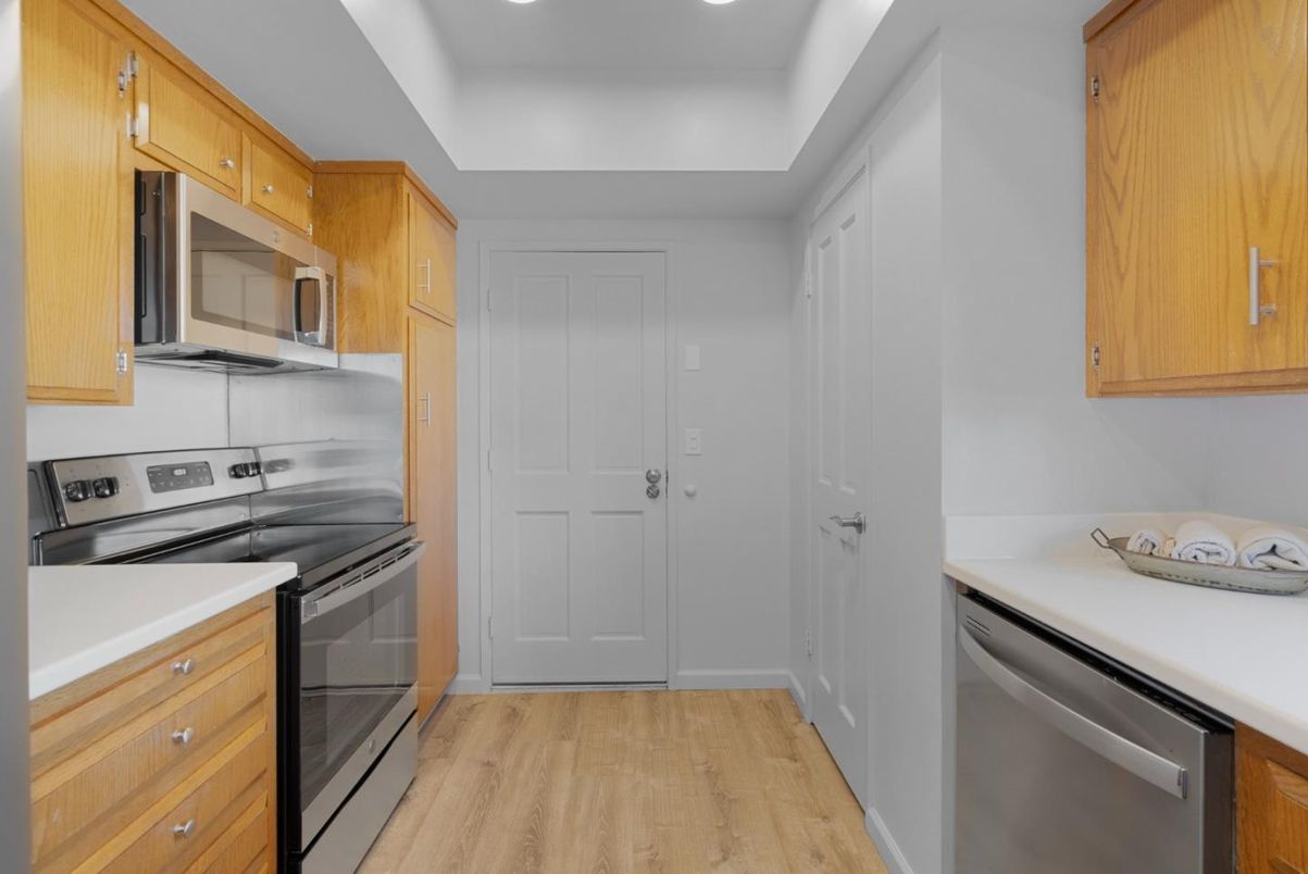 Interior, Kitchen, Recessed Lighting, Stainless Steel Appliances, Wood Texture Flooring