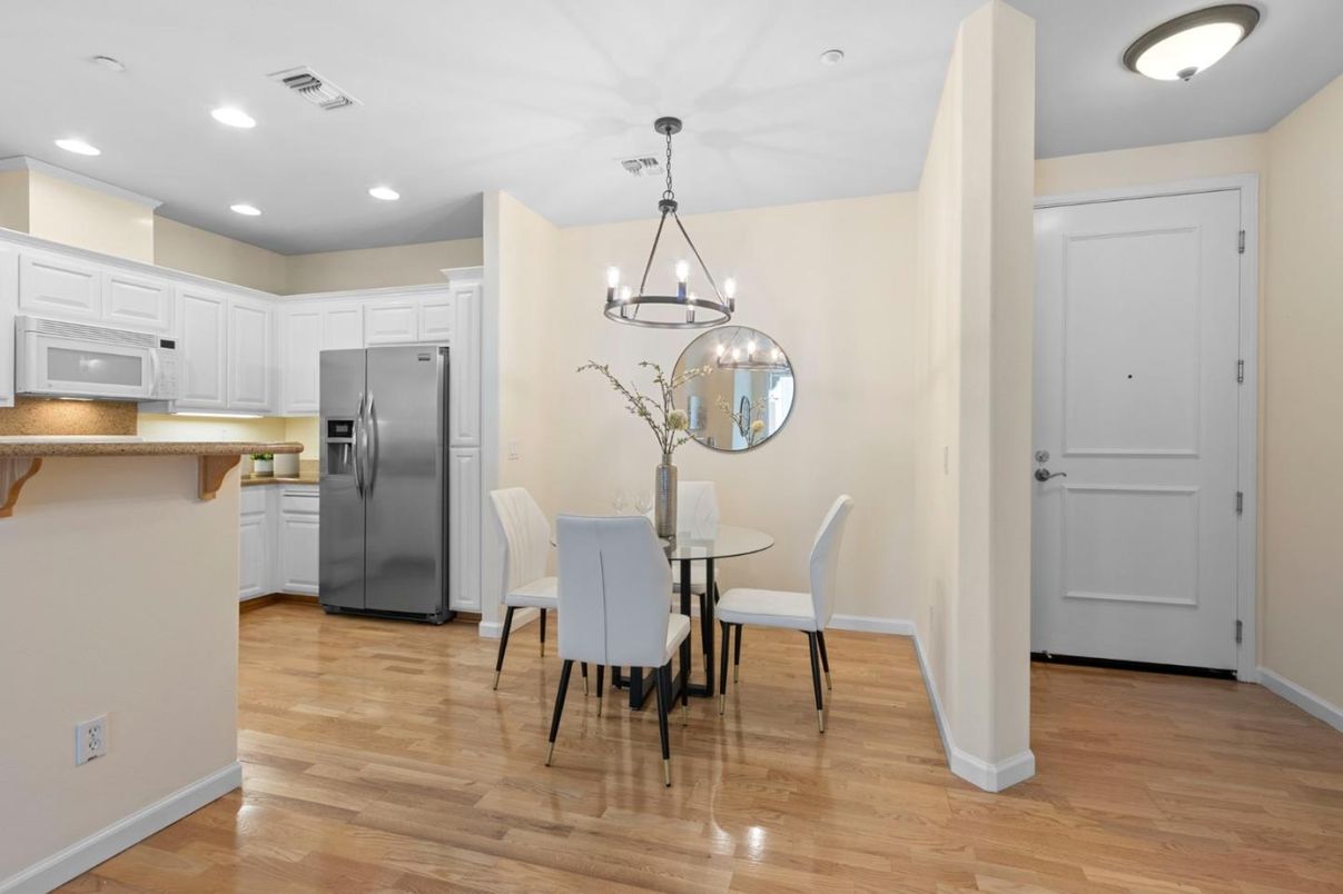 Chandelier, Dining room, Interior, Kitchen, Pendant Lights, Recessed Lighting, Stainless Steel Appliances, Wood Texture Flooring